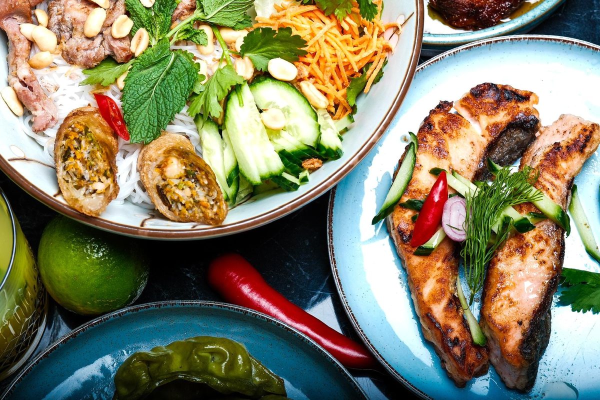 Bún chả with vermicelli, herbs and grilled fish